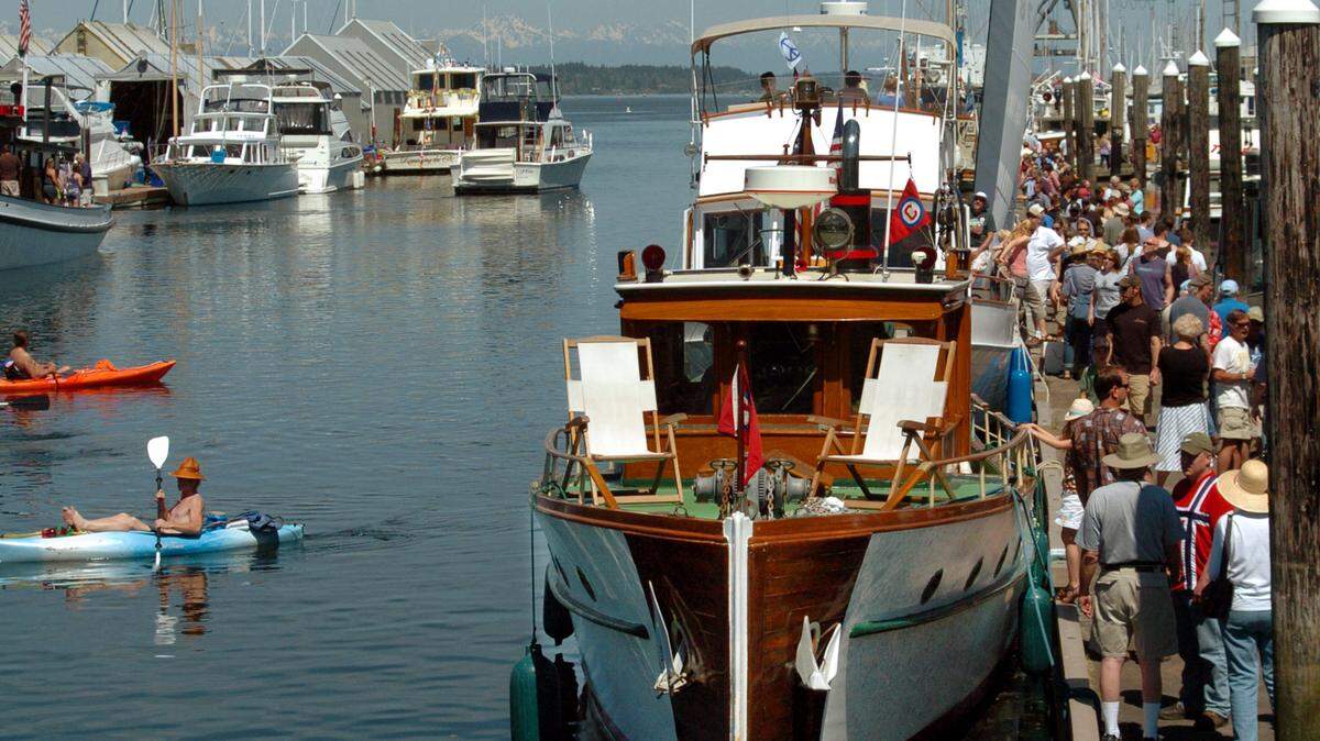 Percival Landing Park was packed for the 2012 Olympia Wooden Boat Fair featuring rows of classic maritime vessels, as well as food, vendors and music.