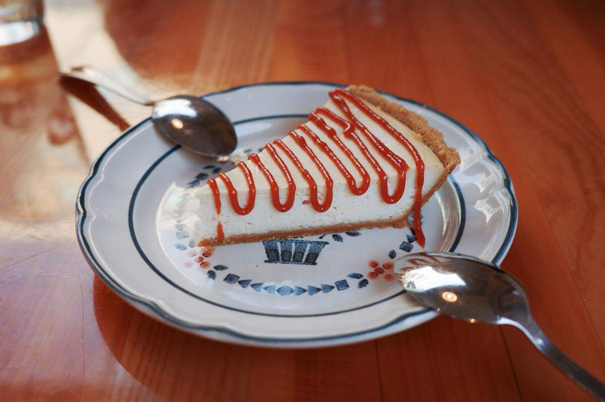 Those who order Abuela’s Cheescake at Mi Luna Cuban Cafe can expect a guava drizzle on top.