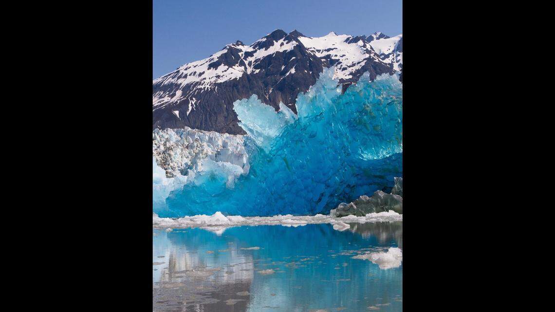 A startlingly blue iceberg has been found in Alaska’s Glacier Bay National Park and Preserve. Experts say it was likely caused by intense compression over years.