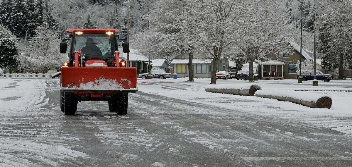 A snowplow rolls down Lincoln Ave. W. In Tenino early Thursday morning as icy conditions around Thurston County greeted the hearty who braved getting out into the elements. A wintry weather advisory extended over South Puget Sound and Olympic Peninsula yesterday evening. In a tweet, the NWS said it had heard reports of trace amounts to 3 inches of snow accumulating on roadways in some places.