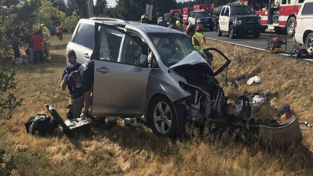 The minivan wreckage after it was hit by a truck on Old Highway 9 in Rochester, WA.