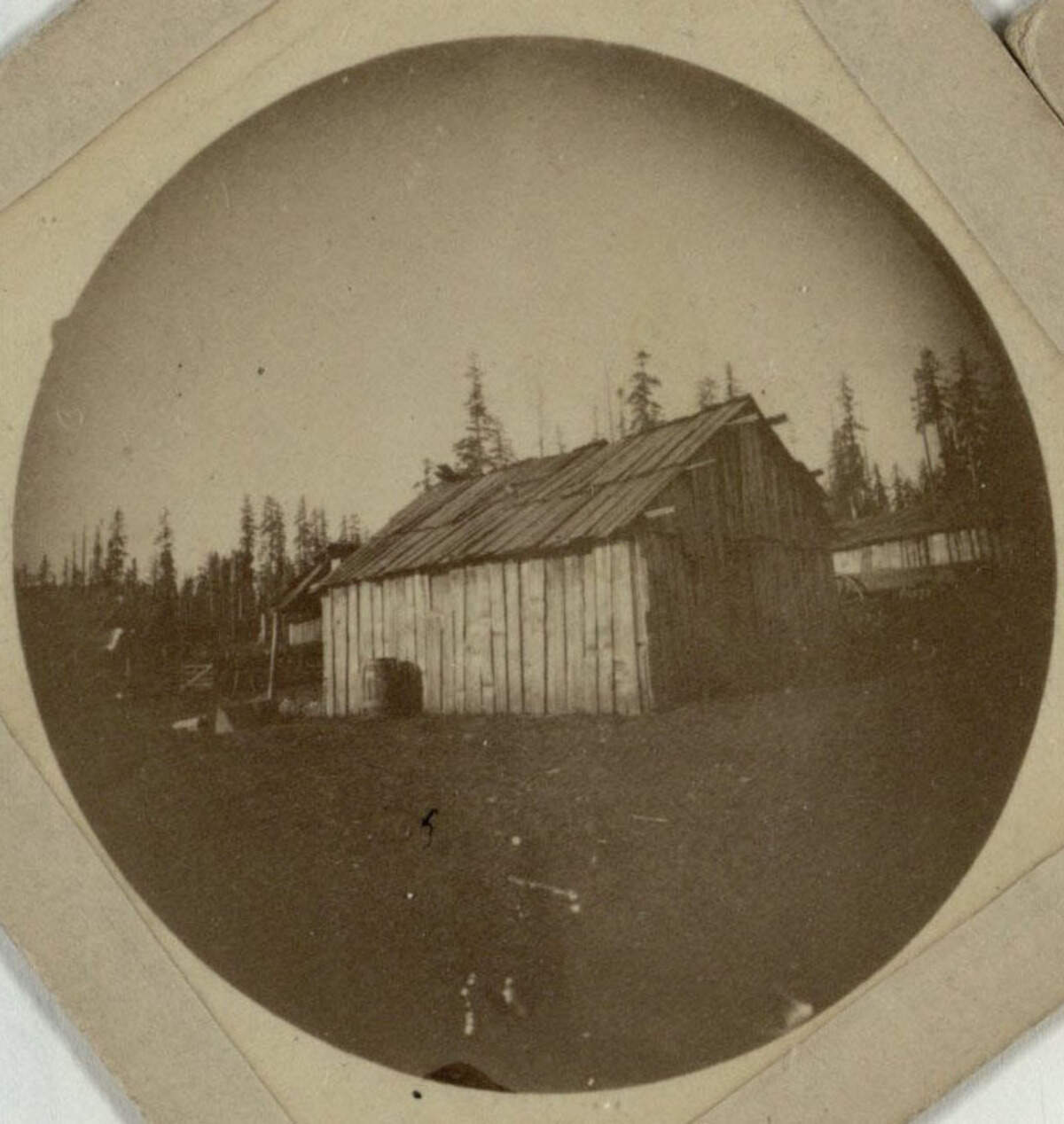 Wickersham is best remembered for his connection with Alaska, but had an earlier career in the Puget Sound area. He befriended members of the Squaxin Tribe in Mud Bay, and as an amateur photographer he documented images of tribal members and living conditions. Shown here is his photograph of a Squaxin home, from the late 1880s or early 1890s.
