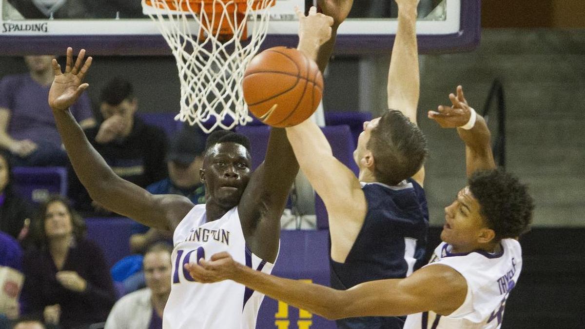 Malik Dime, a 6-foot-9 senior forward, has been suspended indefinitely after he slapped two fans in Colorado’s student section during Washington’s 81-66 loss on Thursday night.