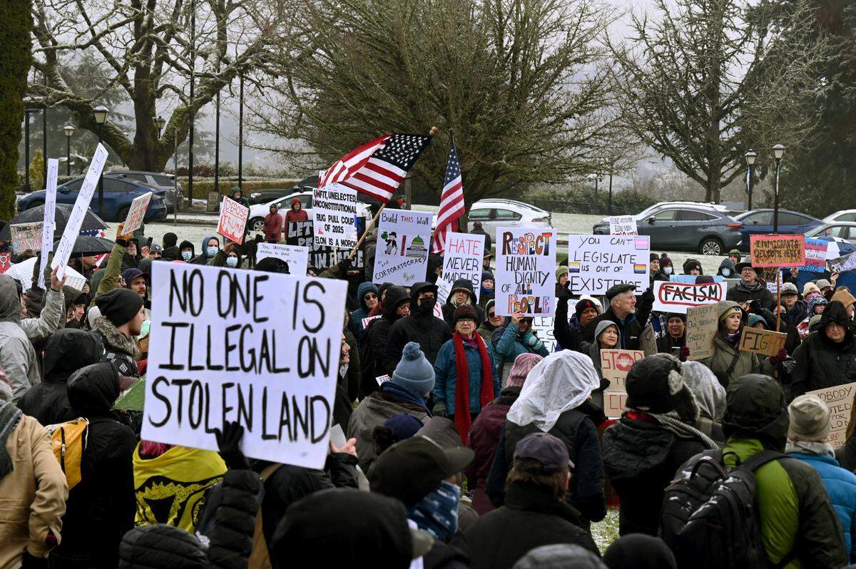 Hundreds of protesters coming from all walks of life assembled in a steady snowfall for a noon rally at the Capitol in Olympia, Wa. in opposition to President Donald Trump’s Project 2025 agenda and specifically, Elon Musk.