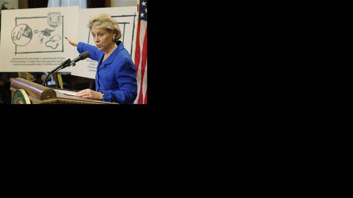 Gregoire lays out massive budget cuts