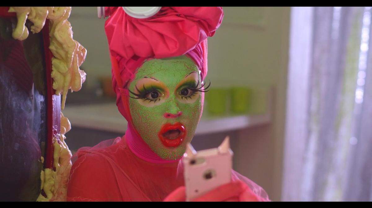 Molly Hewitt’s “Holy Trinity,” available through the Olympia Film Society website, tells the glam tale of a millennial dominatrix who develops a gift for speaking to the dead.