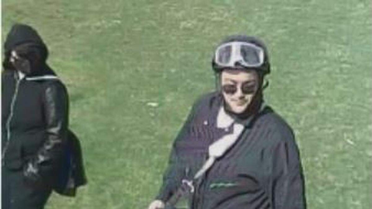 The Washington State Patrol is asking the public to help identify the person in this photo. The person allegedly threw a water bottle that struck a woman in the head during a protest on the state Capitol Campus March 20.