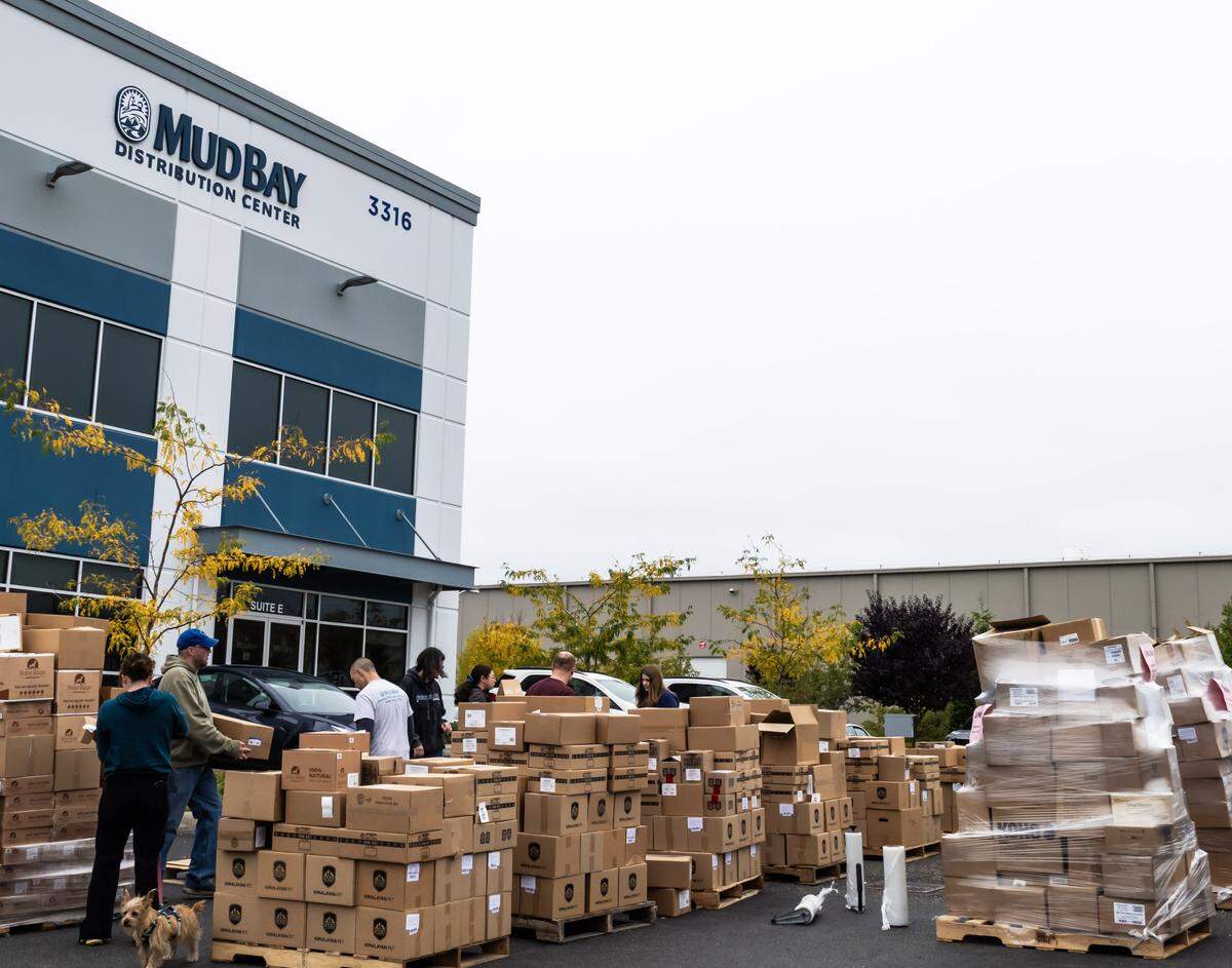 Donations being prepared outside the Mud Bay distribution center.