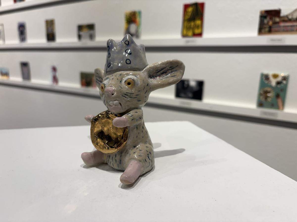 A crowned rat by ceramic artist Crisha Yantis of South Puget Sound Community College is among the works up for auction in the college’s 2026 Fine Art Postcard Exhibition.