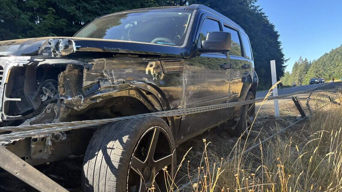 Driver knocks down long stretch of highway cable barrier in west Thurston County