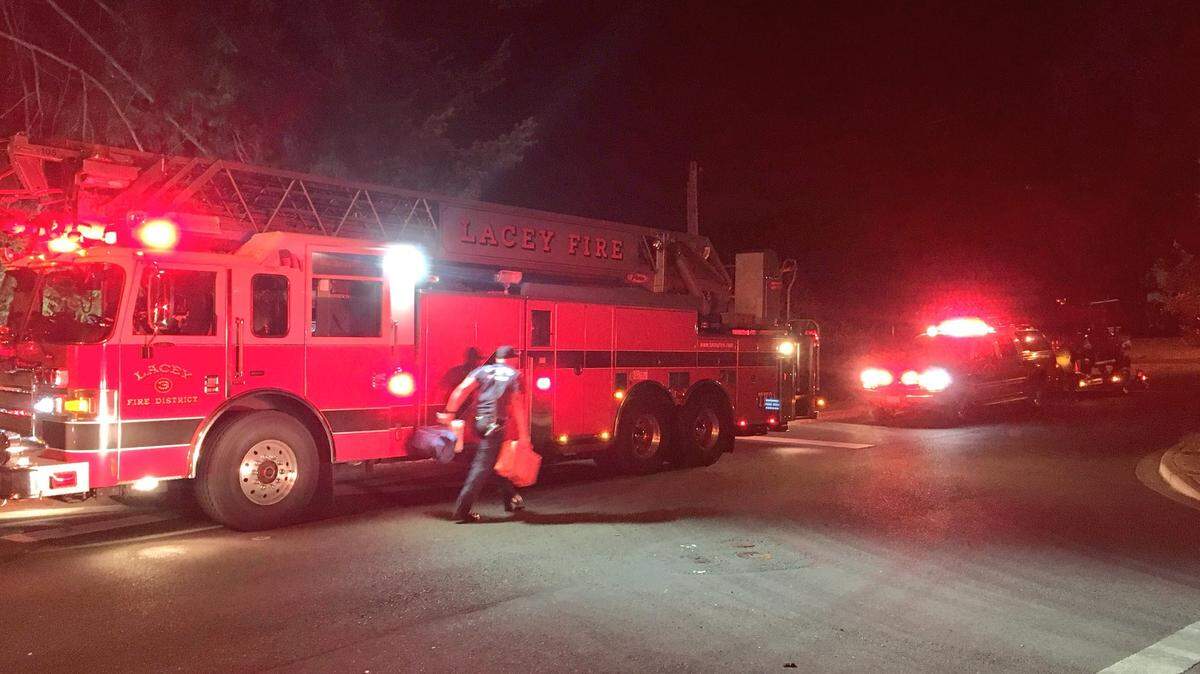 A woman was flown to Harborview Medical Center in Seattle Sunday night after she was struck by a freight train, according to Lacey Fire District 3.