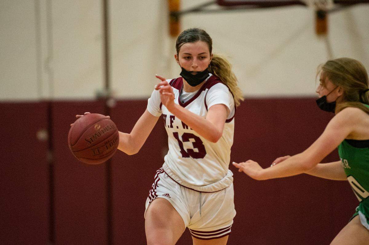W.F. West’s Drea Brumfield (13) drives the ball upcourt in a game against Tumwater during the 2021 spring season.