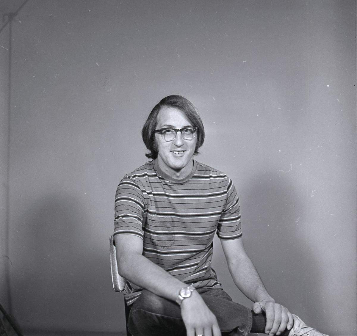 A young Ken Balsley poses for a photograph to accompany an article from 1971 that identified him as a student representative to The Evergreen State College Board of Trustees. He has remained in the Olympia area as a broadcaster, commentator, journalist and political activist. Image selected and captioned by Deborah Ross on behalf of the Olympia Historical Society and Bigelow House Museum.