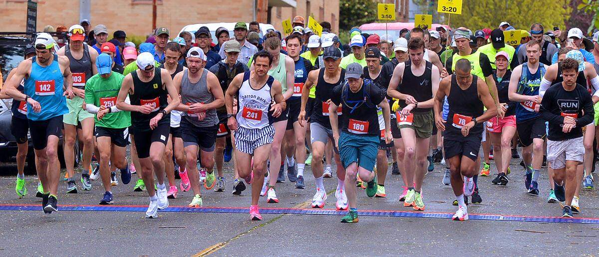 Wearing bib number 241 Olympia’s Jesse Sevick started in front and stayed there while winning his 11th men’s division title at the 2022 Capital City Marathon on a dark and damp Sunday, May 15.