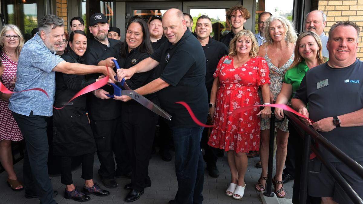 Kicking off a July 6 ribbon-cutting sponsored by the Thurston County Chamber of Commerce, 1889 Prime Steakhouse co-owner Andrew Barkis, bar manager Sarah Knutson, Chef Josh Race, along with co-owners Nicole Andres and Drew MacEwen, do the honors to celebrate their upcoming August grand opening. The new downtown Olympia restaurant is located on the ground floor of the Views On Fifth building.