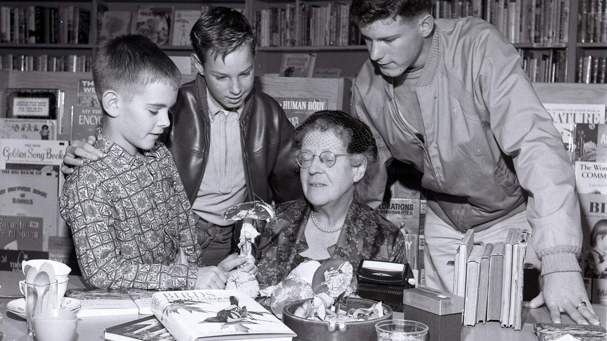 Margaret McKenny meets with students at Pat’s Bookery in downtown Olympia to autograph her book “The Savory Wild Mushroom.” A local park, campground, and elementary school are all named after McKenny.