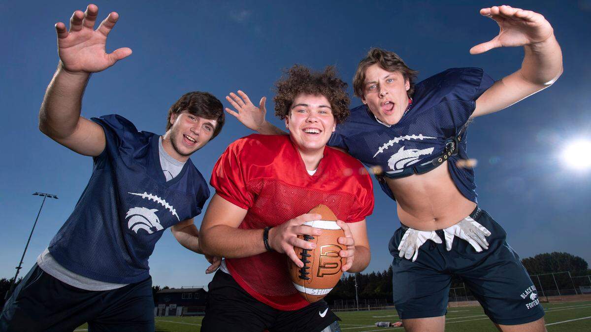 Black Hills senior running back Johnnie Stallings (from left), sophomore quarterback Jaxsen Beck and senior tight end Keegan Rongen have lead the Wolves to a 3-0 start for the first time since 2018. The trio are shown before football practice at Black Hills High School in Tumwater, Washington, on Wednesday, Sept. 21, 2022.