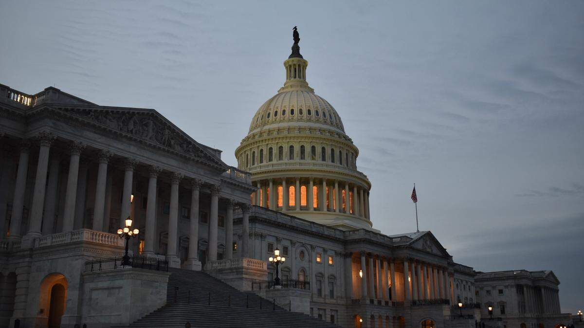 The sun sets over the US capitol