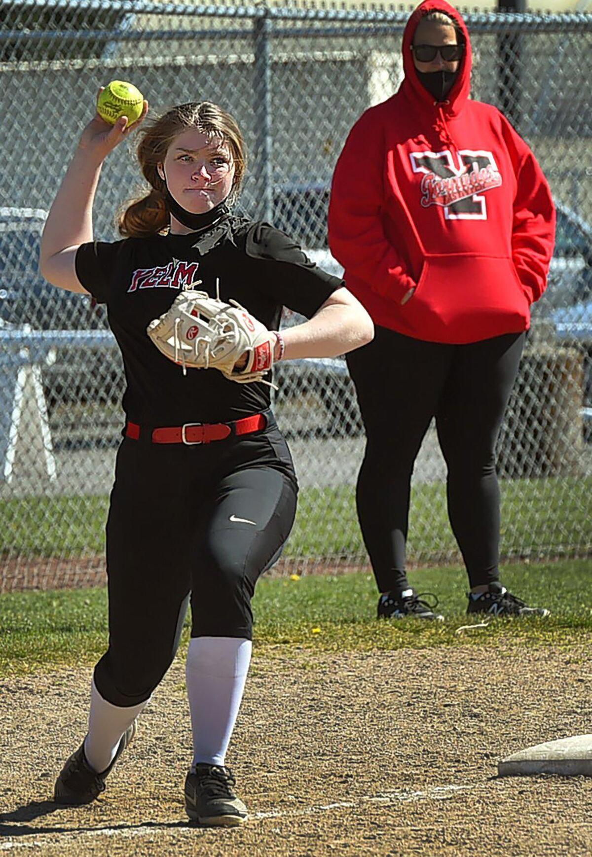 Ashlyn Aven fires a throw from third base during the TornadosÕ practice on April 12,2021.