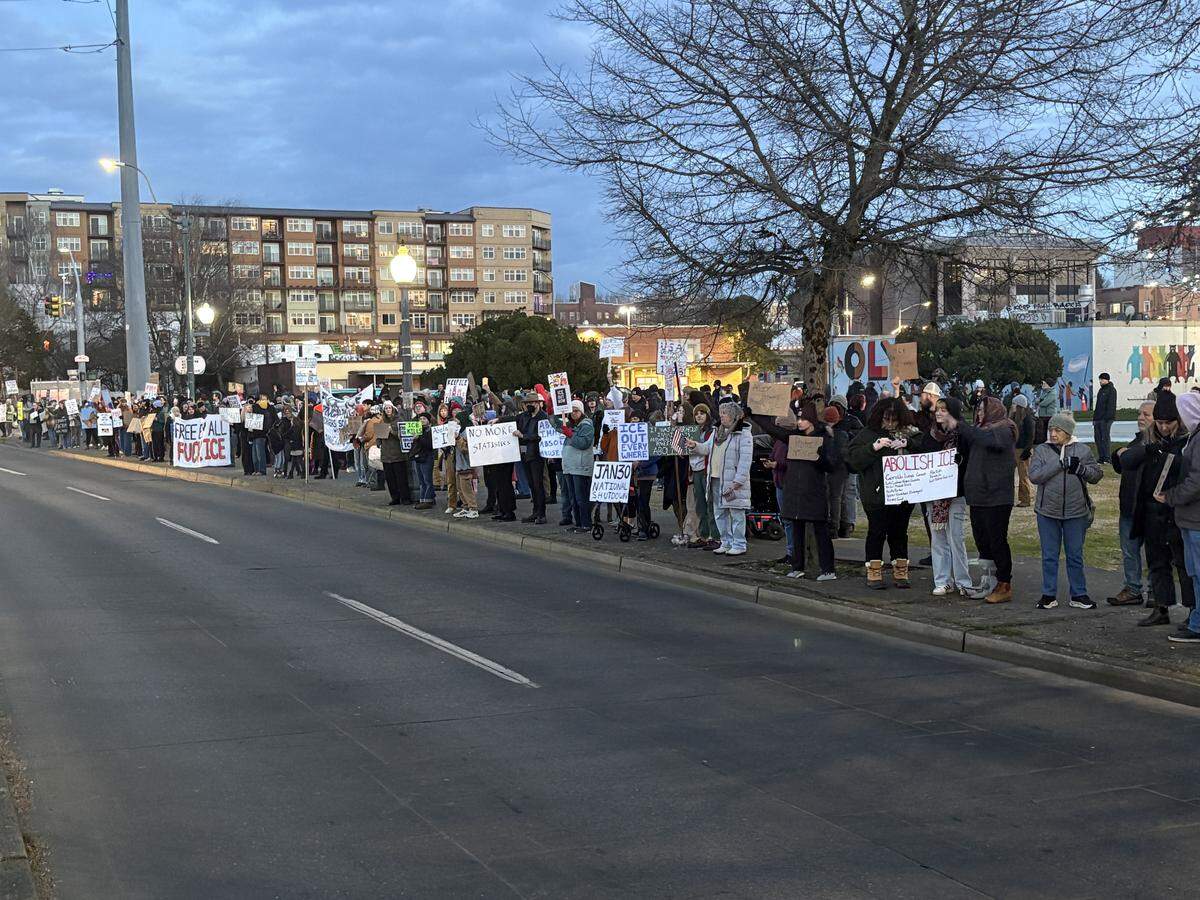 Around 200 people gathered along Fourth Avenue Monday evening to protest ICE, also known as U.S. Immigration and Customs Enforcement.