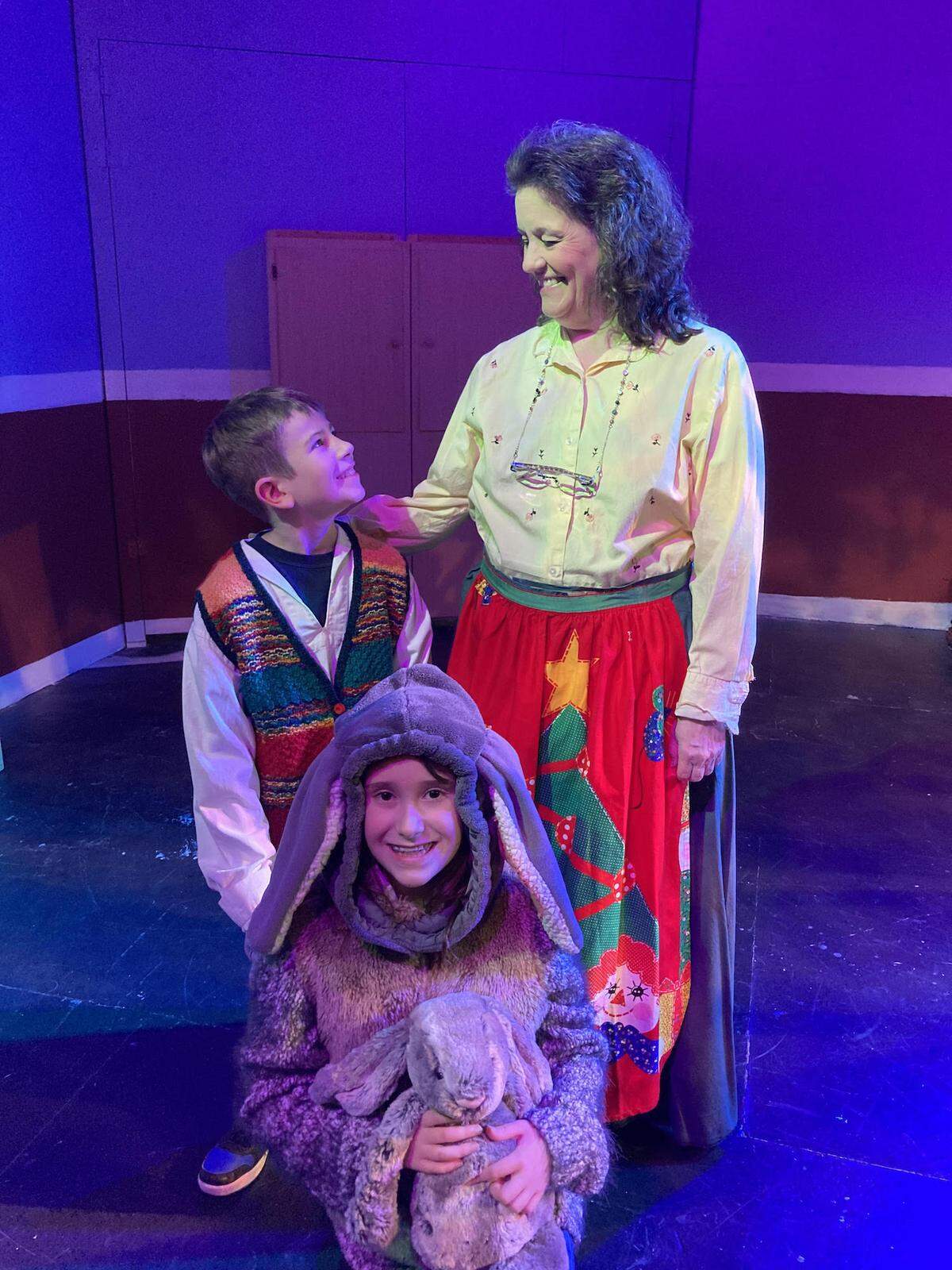 Olympia Family Theater’s “The Velveteen Rabbit,” opening Friday, Dec. 8, features Atticus Cunningham, 10, as Jamie; Amelie McClain, 9, as the titular rabbit, and Debbie Sampson as Nana.