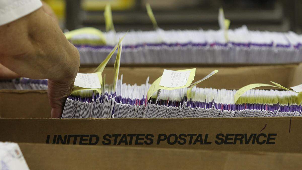 Mailed-in Thurston County ballots wait to be processed.