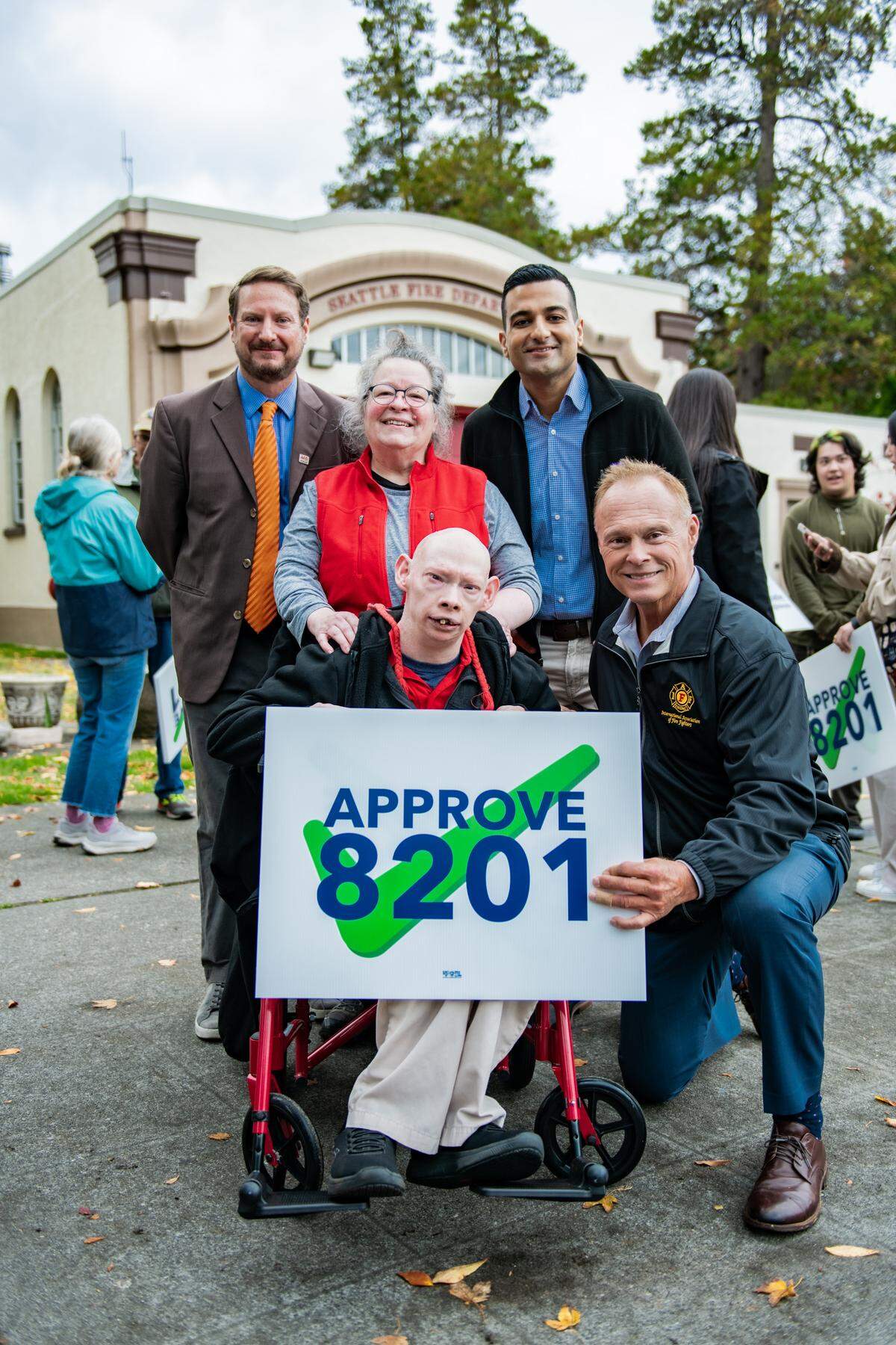 Advocates show support for Ballot Measure 8201 at a press event in Seattle on Oct. 9, 2025.