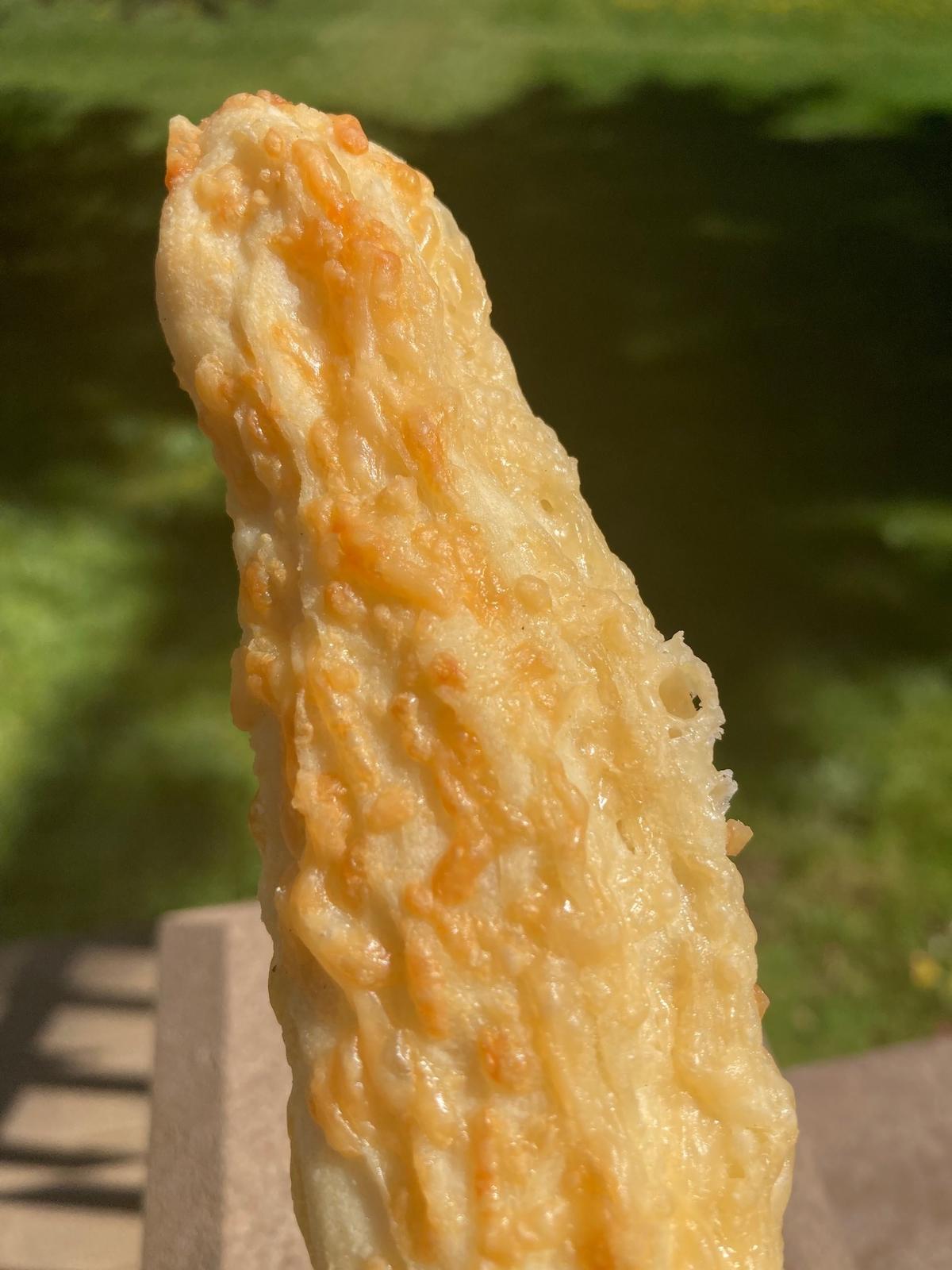 A cheesebread stick from the San Francisco Street Bakery at the Olympia Farmers Market.