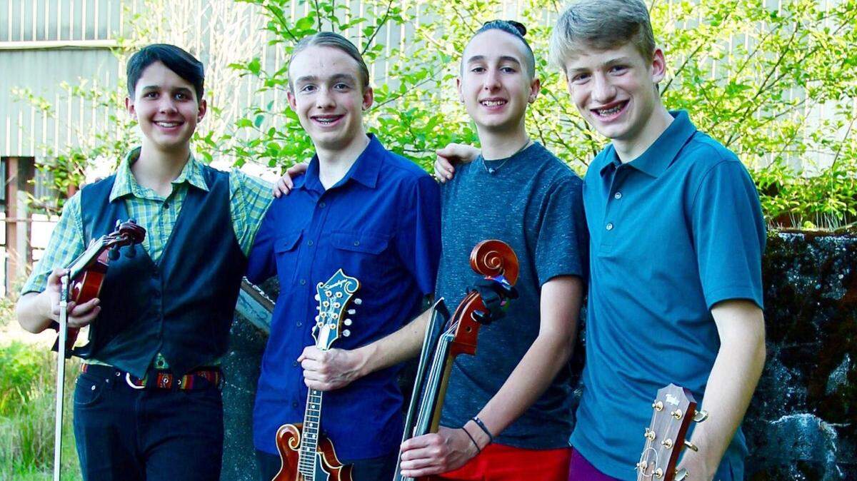 REDS Band will celebrate its new CD with a free concert at Traditions Cafe on Friday, Sept. 7. From left are Eros Faulk, 14; River Scheuerell, 17; Dante Faulk, 16; and Sage Scheuerell, 14, all from Olympia.