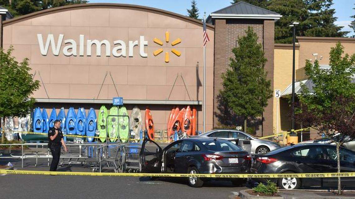 The armed gunman who was shot and killed outside the Tumwater Walmart Sunday afternoon was identified Monday as Tim O. Day, 44, of McCleary, Thurston County Coroner Gary Warnock said.