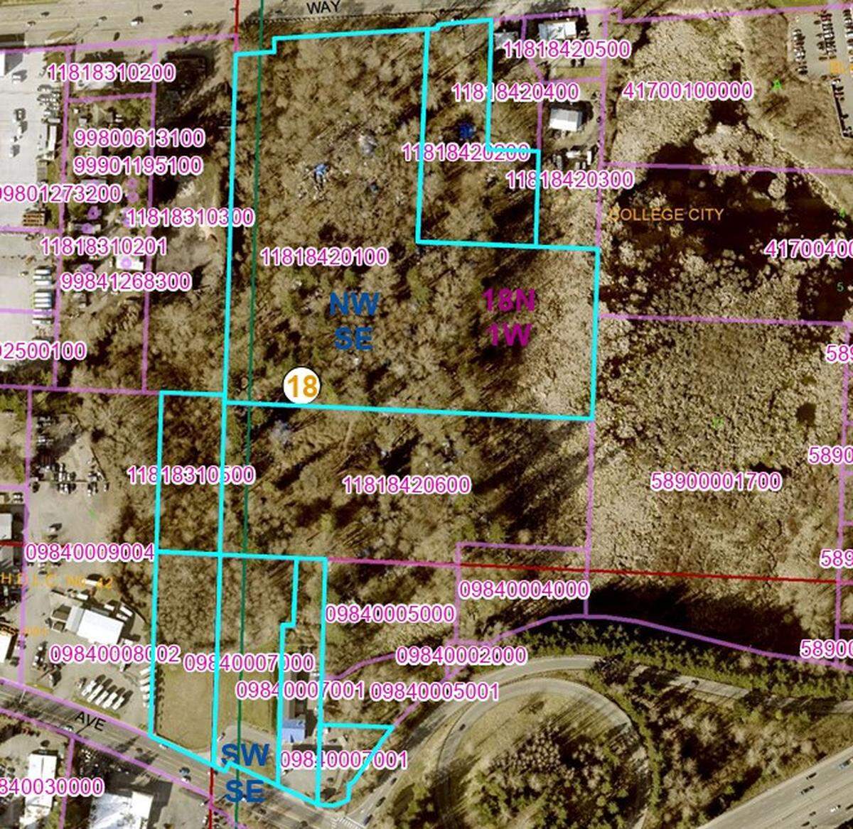 The property outlined in blue is owned by JJP Group LLC, according to the Thurston County Assessor’s Office data. Much of that property is occupied by a homeless encampment called the Jungle.