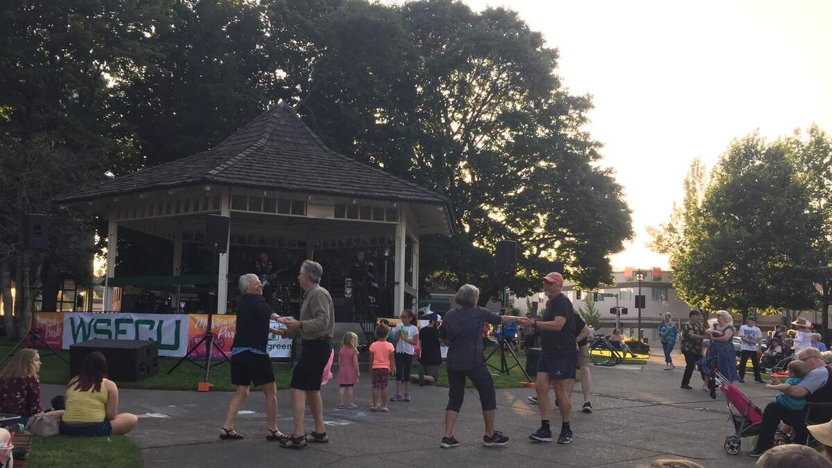 People dance during a Music in the Park concert at Sylvester Park in 2019.