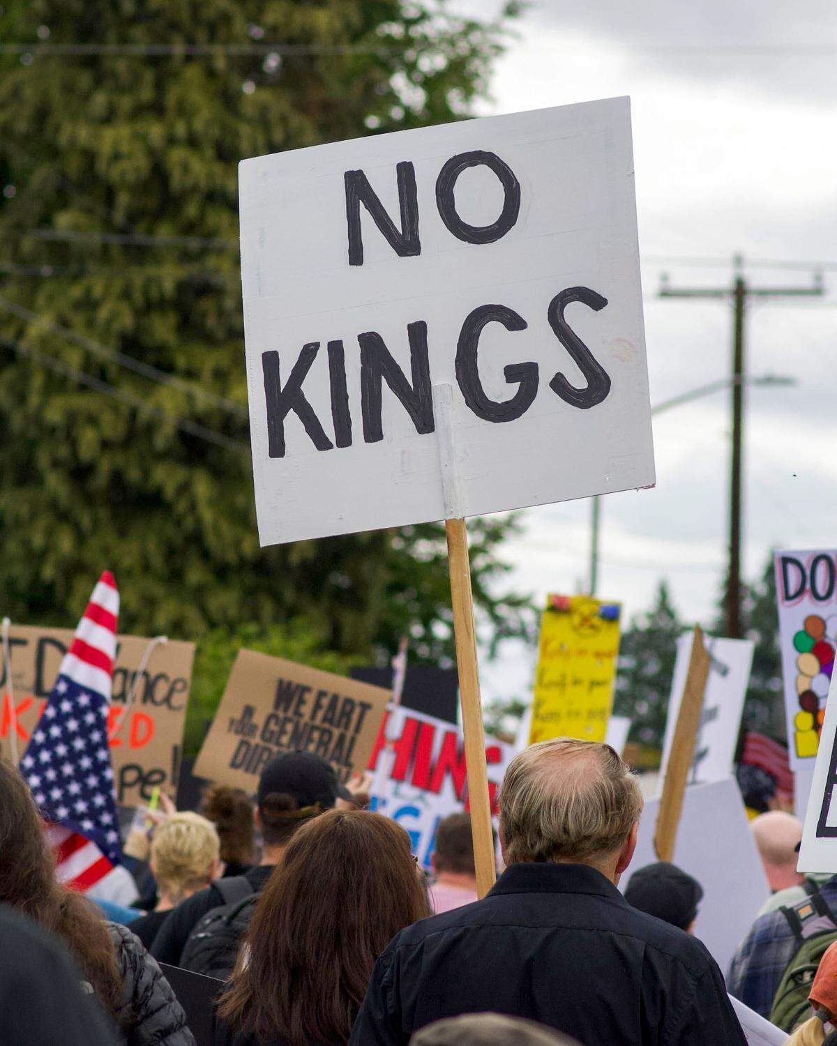 The People’s Rebellion group marched from the Capital Mall in west Olympia to the state Capitol where the group joined the larger “No Kings” protest on Saturday, June 14, 2025, in Olympia, Wash.