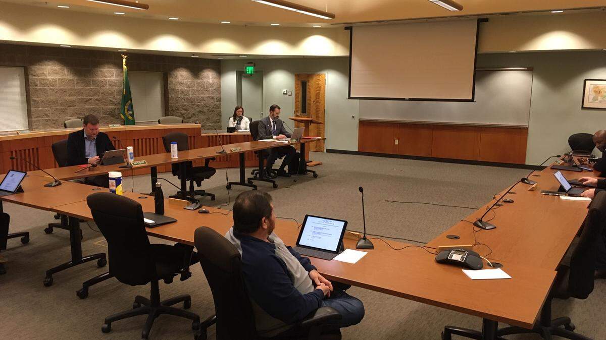 Lacey City Manager Scott Spence told Lacey City Council Thursday night that hiring has been put on hold and all city travel has been suspended.