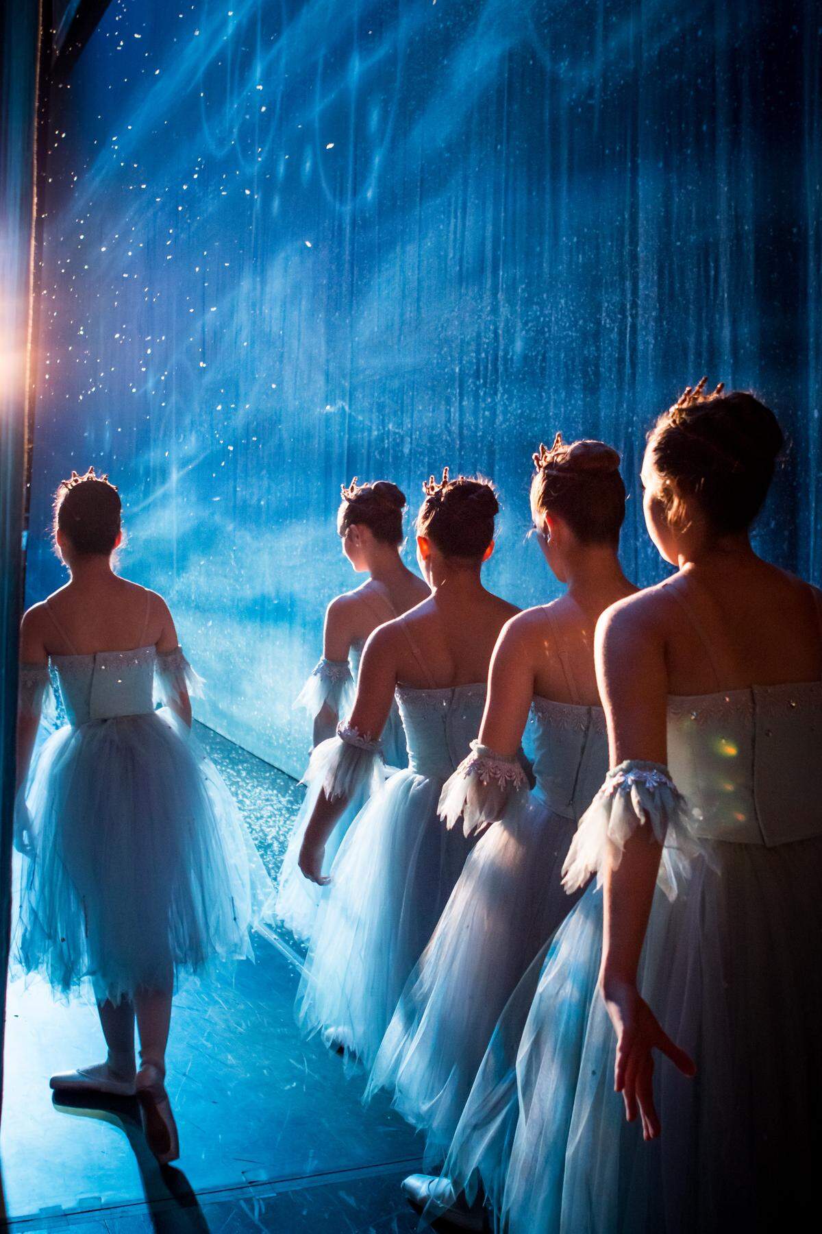 Dancers prepare to take the stage for the Waltz of the Snowflakes.