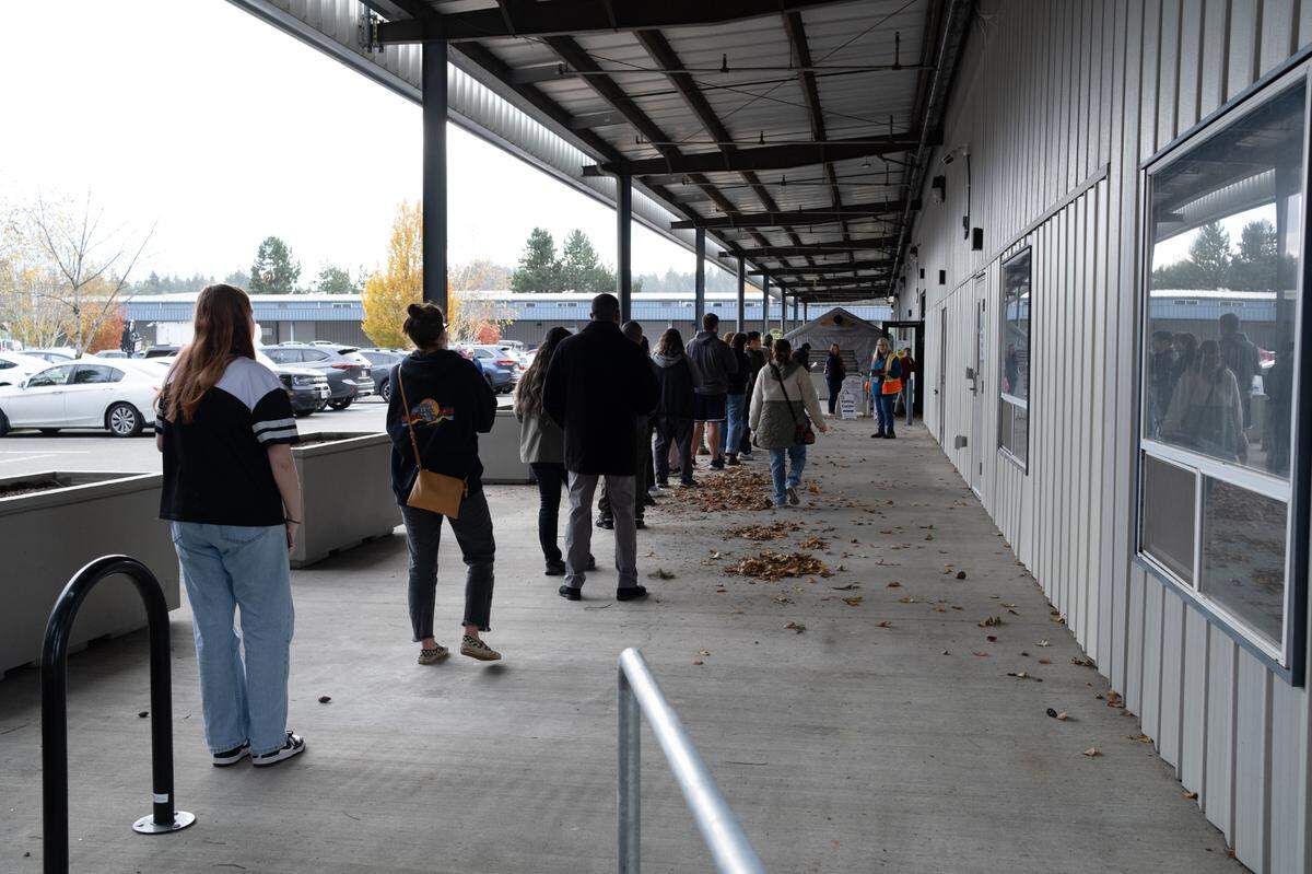 Citizens lined up to vote at Thurston County’s voter services center the Tumwater Mottman neighborhood Tuesday, Nov. 5, 2024. The line moved at a steady pace.