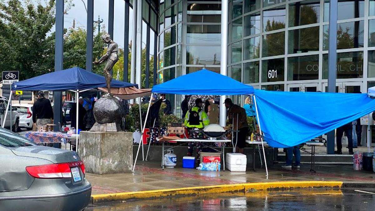 A gathering of Proud Boys and counter-protesters outside City Hall in downtown Olympia Sept. 18 was peaceful, the Olympia police chief said.