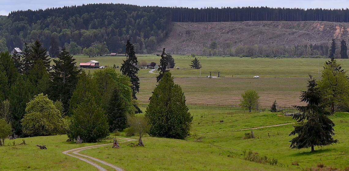 Touring land that has been in her Tenino family for generations Colvin Ranch owner Jennifer Colvin along with Bill Kronland, Scatter Creek Wildlife Area Manager for the Washington Department of Fish and Wildlife, speak to the environmental benefits to the conservation grazing method to land stewardship.