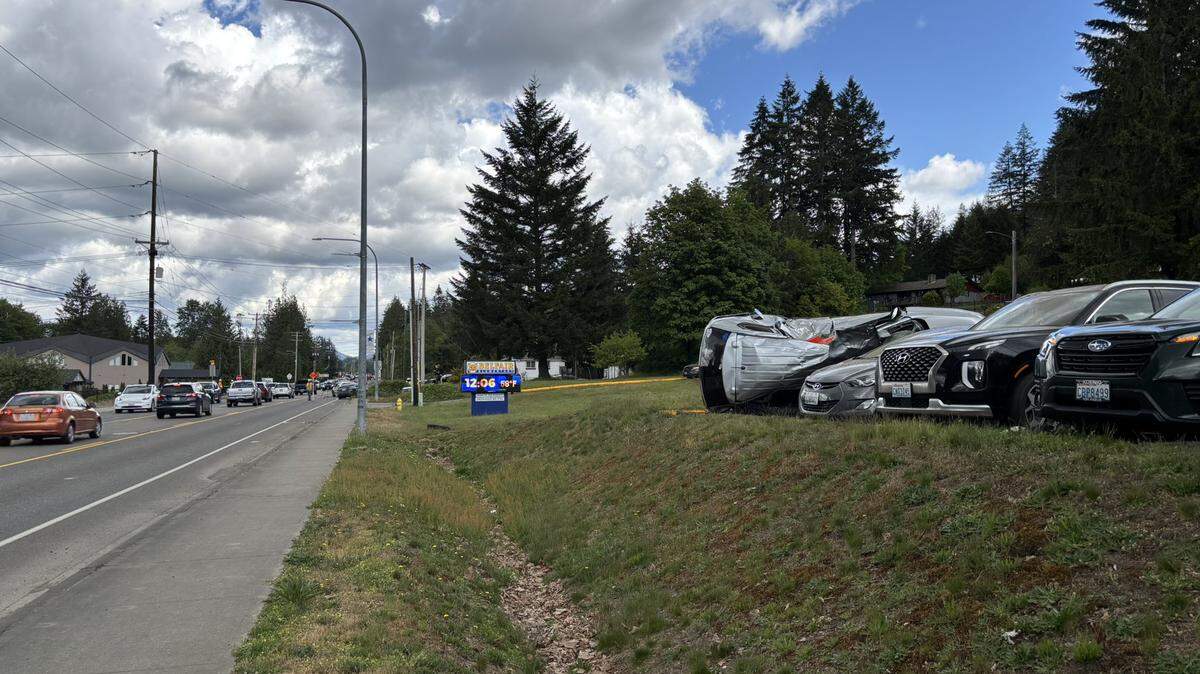 The man crossed the center line, hit two oncoming vehicles, then drove into an elementary school parking lot and damaged five vehicles, WSP says