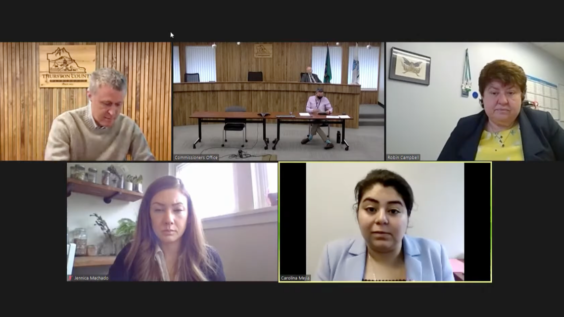 Commissioner Carolina Mejia reacts to a preliminary proposal outlining how the county may spend $56 million in COVID-19 relief funds during a meeting Thursday, March 18. She was joined by commissioner Tye Menser, commissioner Gary Edwards, county manager Ramiro Chavez, assistant county manager Robin Campbell and economic development manager Jennica Machado.