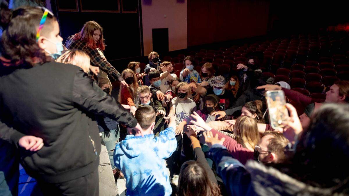 Participants in The Bridge Music Project, an Olympia-based non-profit that teaches music to young artists, gather during a performance.