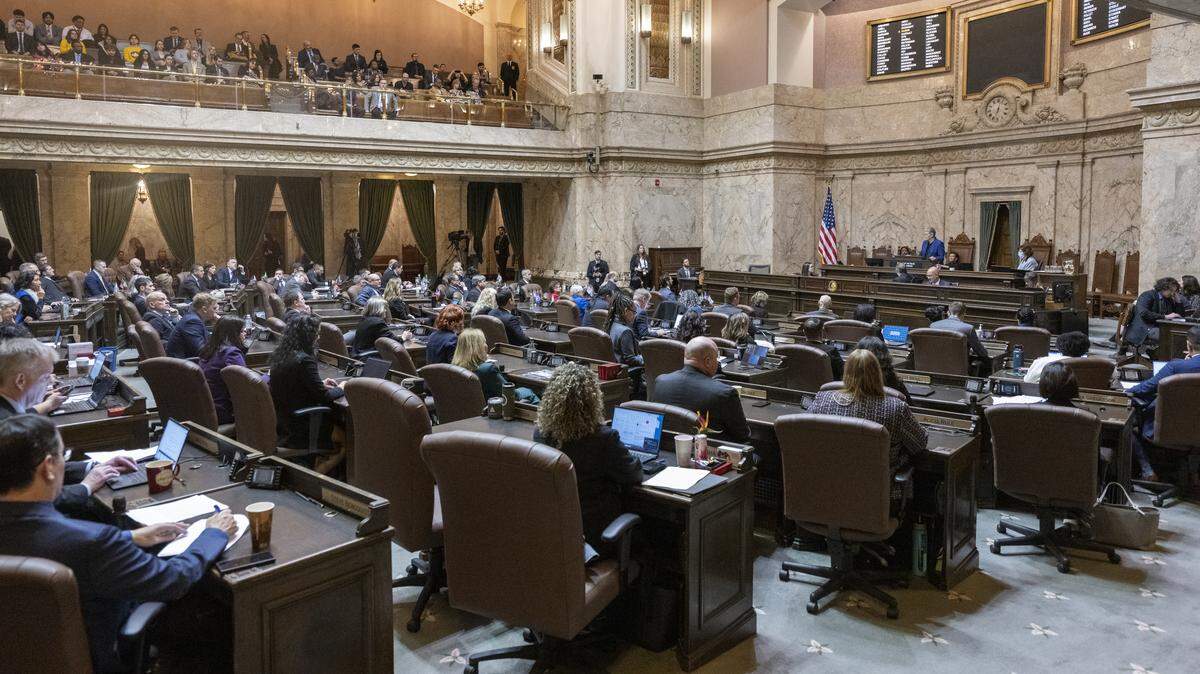 The House of Representatives gather for the first day of the Washington state Legislature’s 60-day session on Monday, Jan. 12, 2026, in Olympia, Wash.