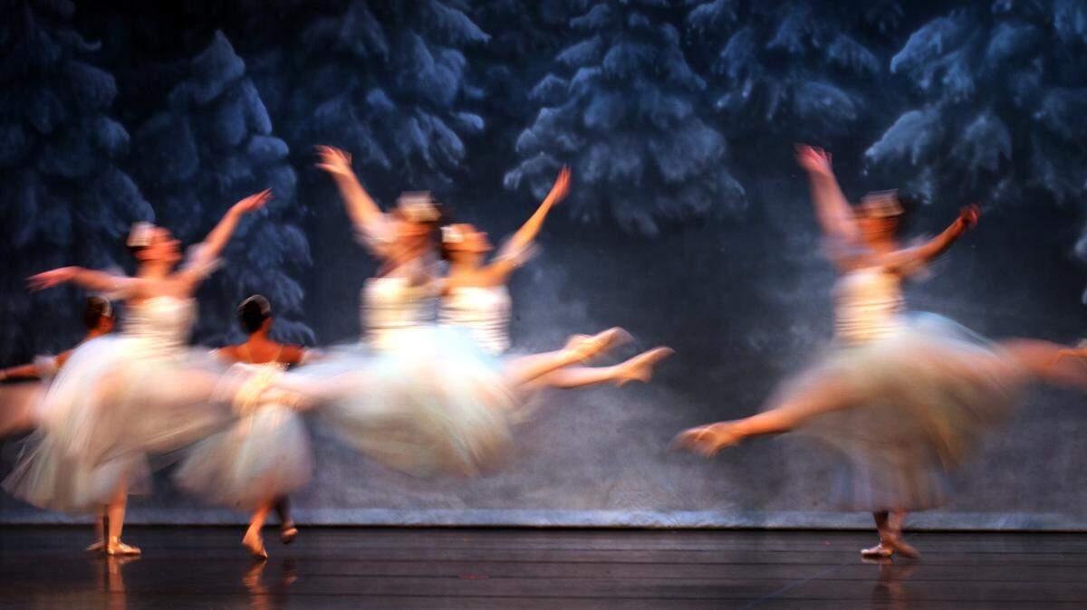 Snow dancers glide across the set in the 2013 production of Ballet Northwest’s Nutcracker.