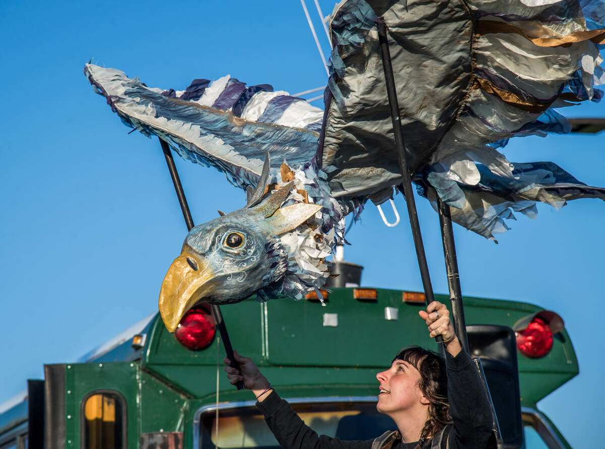 Emily McHugh, String and Shadow Puppet Theater’s co-founder and chief puppet designer, brings a bird puppet to life.