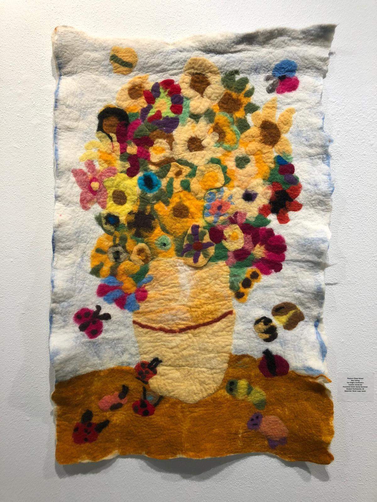 Students worked together on a 30-inch-by-45-inch wall hanging inspired by Vincent Van Gogh’s “Sunflowers.”