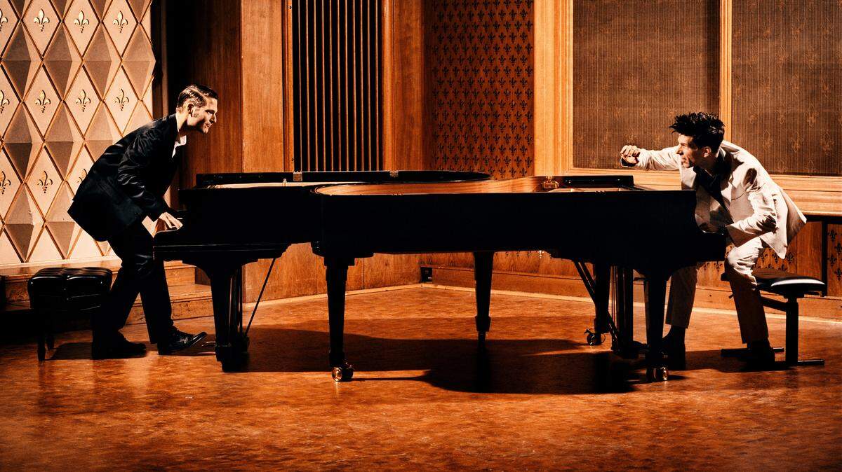 “Piano Battle” is a classical piano concert and a comedy show in which pianists Paul Cibis (left) and Andreas Kern (right) alternately display their abundant chops and cut on one another.