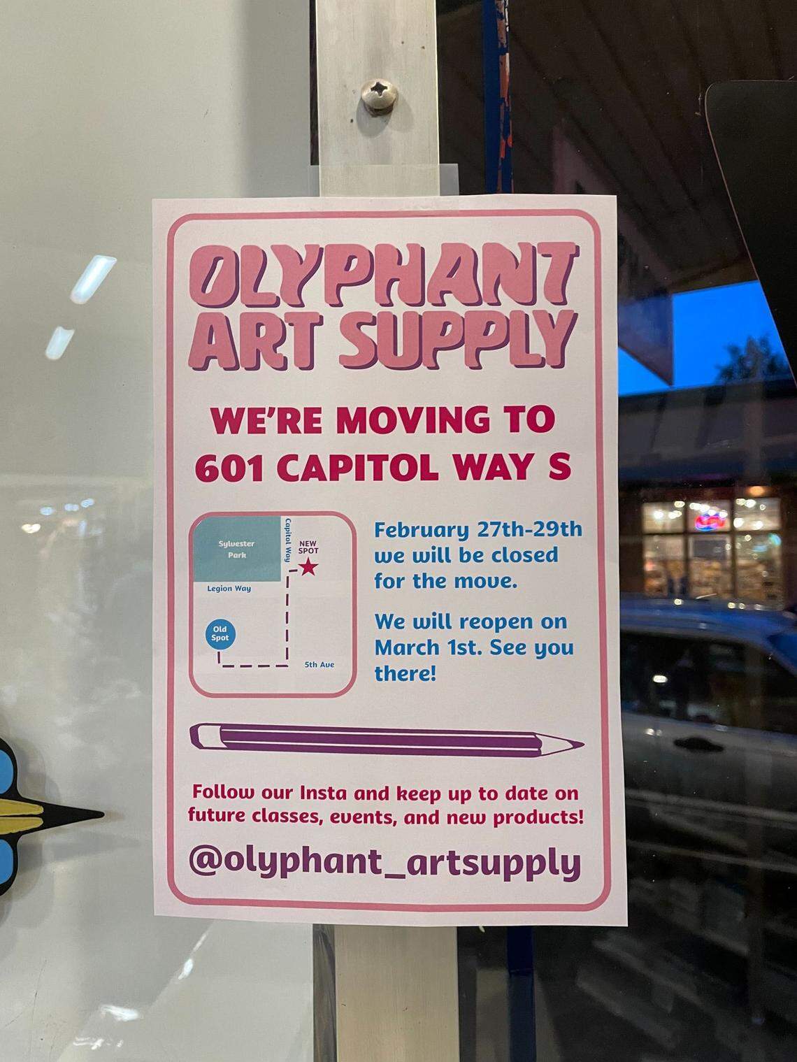 A sign announcing the Olyphant move.