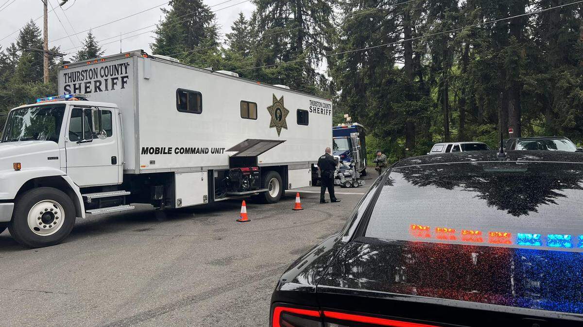 Sheriff Derek Sanders shared this photograph of the law enforcement presence outside a home on the 10500 block of Old McKenna Road Southeast on Tuesday. The Sheriff’s Office reports an armed individual committed suicide after a six-hour stand-off with the Thurston County SWAT Team.