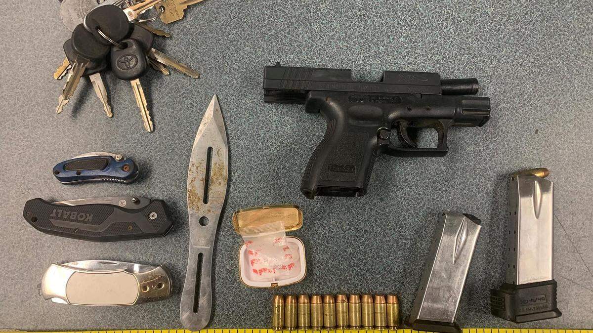 After two people were detained for theft, police say they found weapons and other items inside a baby stroller used by the suspects.