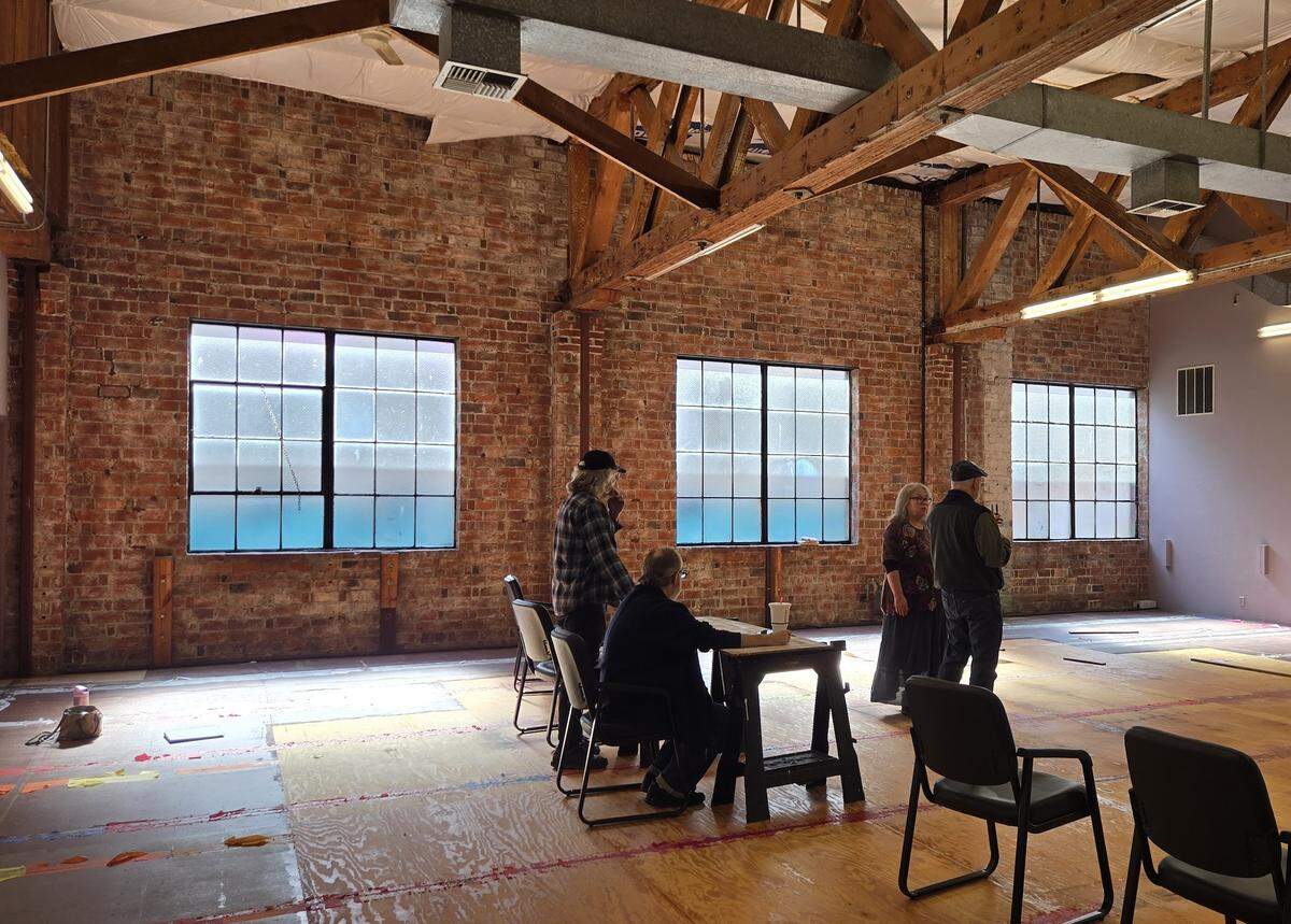 Theater Artists Olympia rehearses a show in its new space, still to be transformed from a dance studio to a theater. From left are Marko Bujeaud, George Dougherty, Pug Bujeaud and John Serembe.